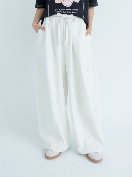 挺版彎刀膠印造型寬褲