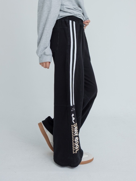 斜裁條紋織帶運動風格寬褲